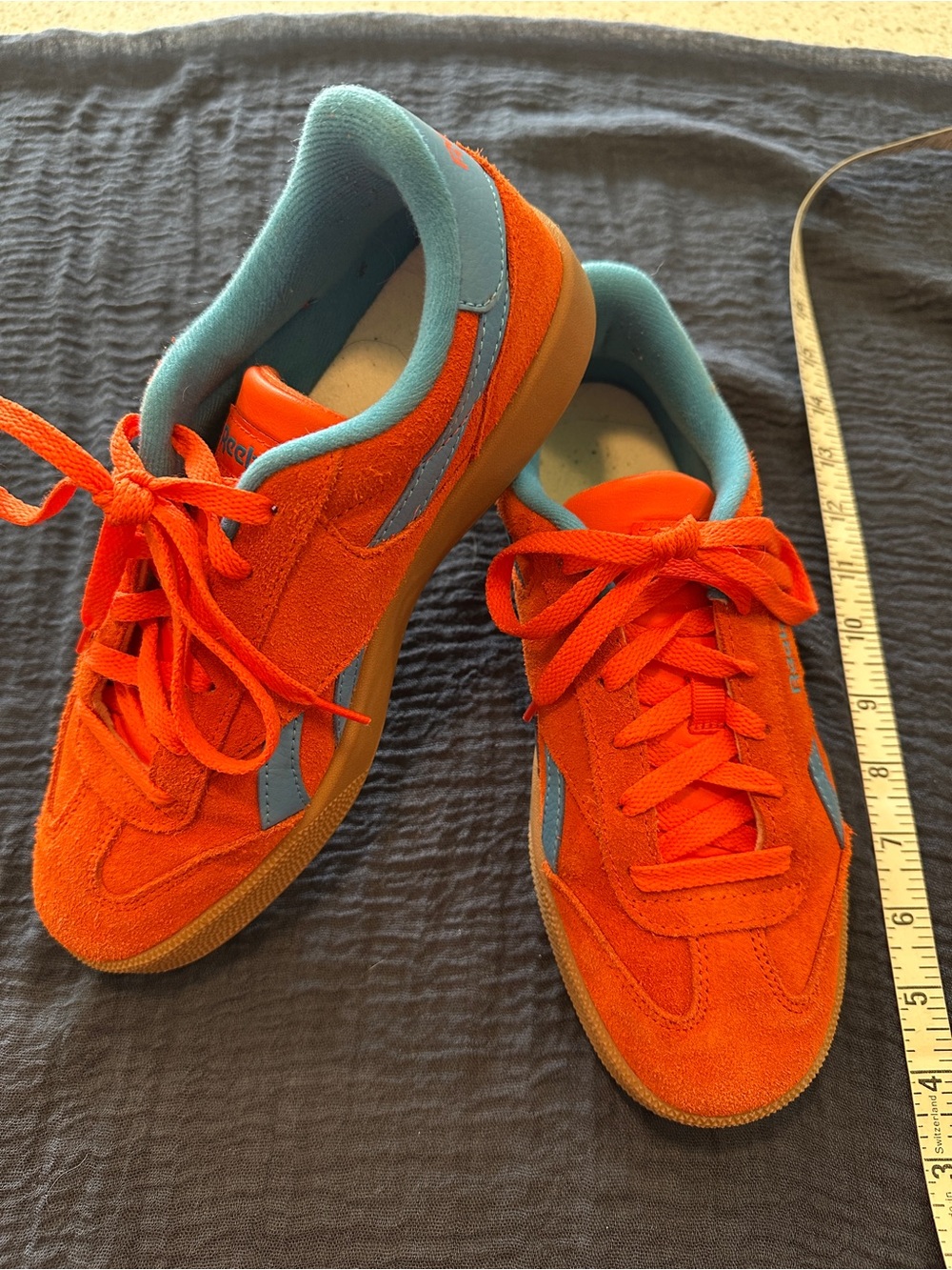 Unisex Reebok Orange Suede Sneakers with Blue Trim